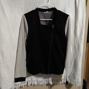 Women's quilted heavy black jacket with sweatshirt sleeves